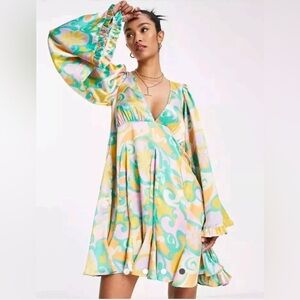 ASOS DESIGN mini dress with flared sleeves in bright abstract floral Size 14
